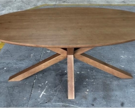 BROWN OVAL DINING TABLE